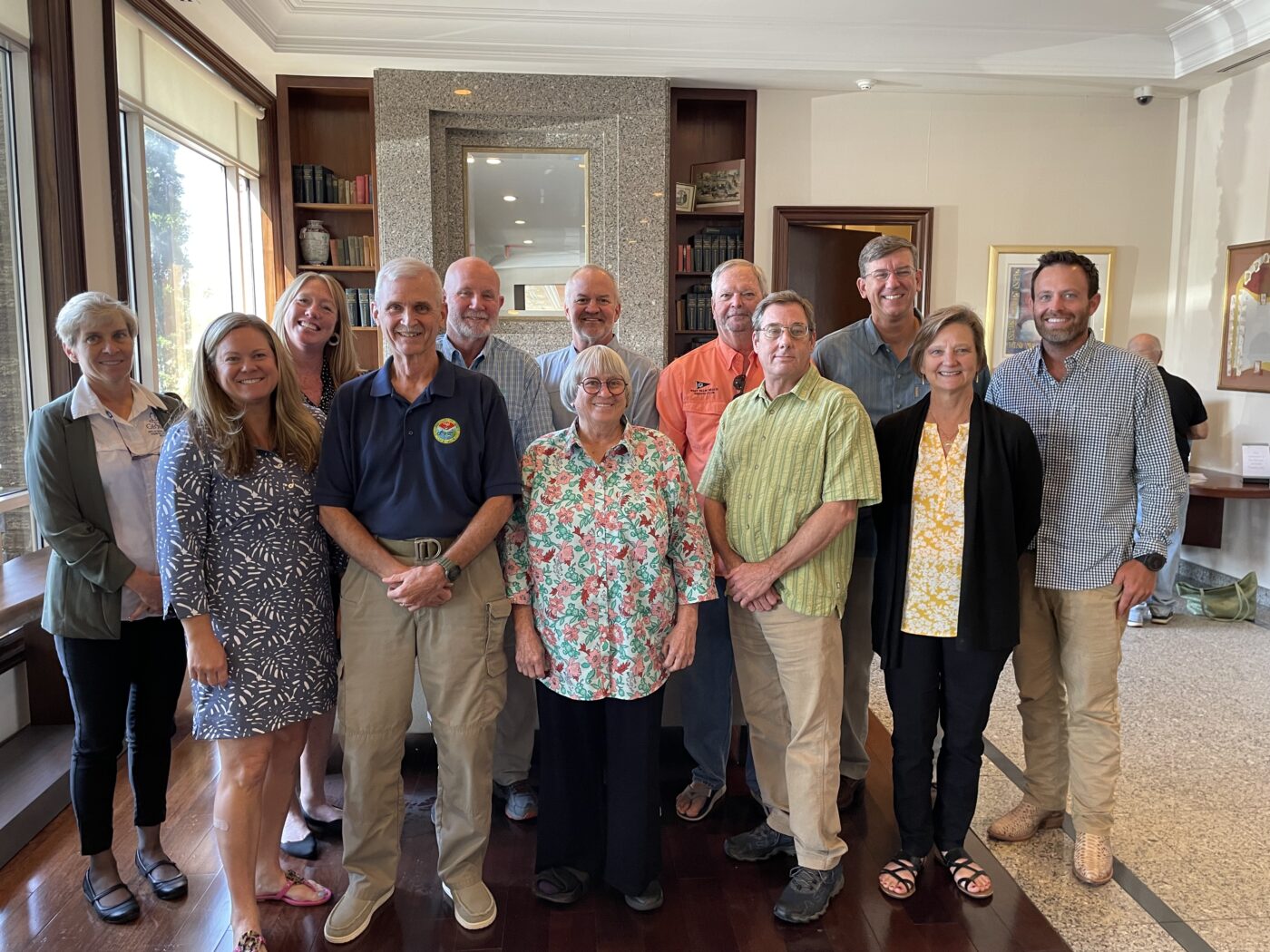 A photo of Council members posing in the lobby of the Town and Country Inn at Charleston, SC.