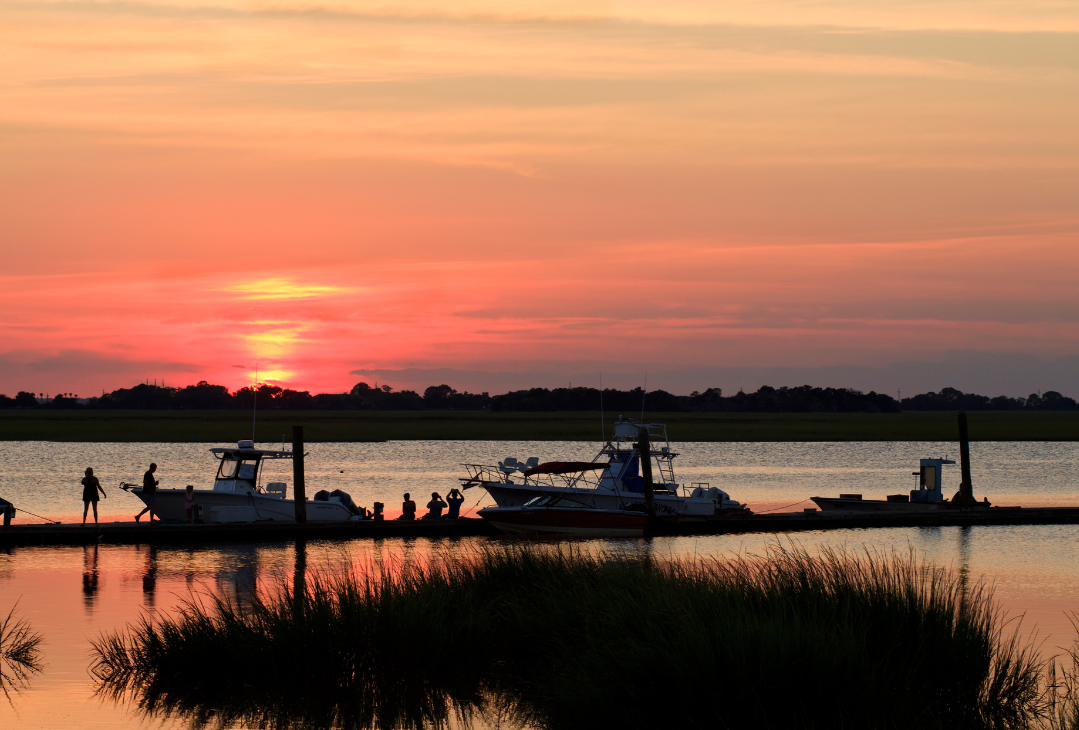 A marina and two boats at sunset in Jekyll Island, Georgia.